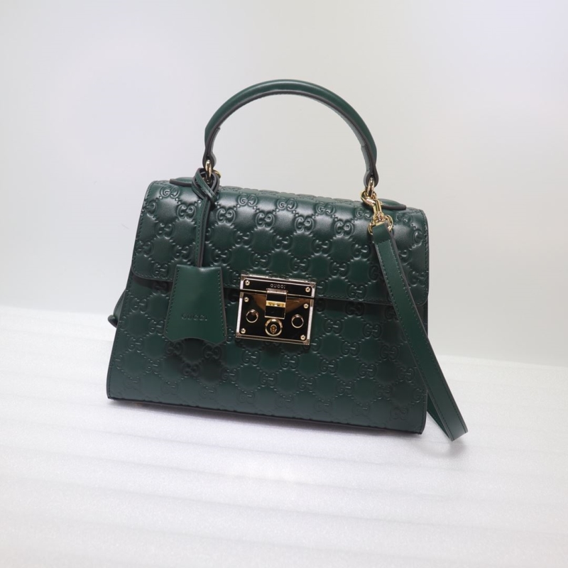 G*u*i top handle bags